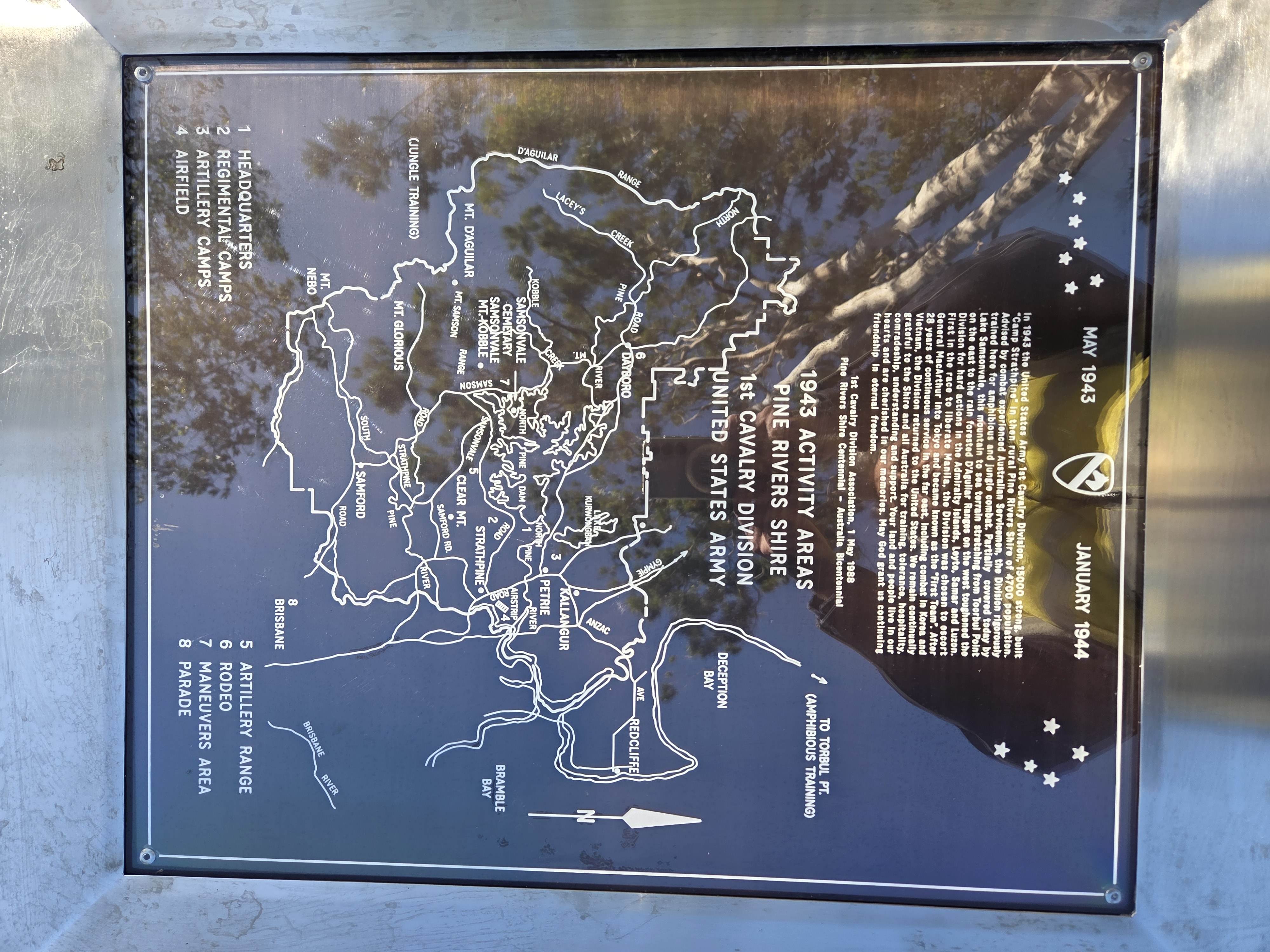 The memorial plaque showing text and map