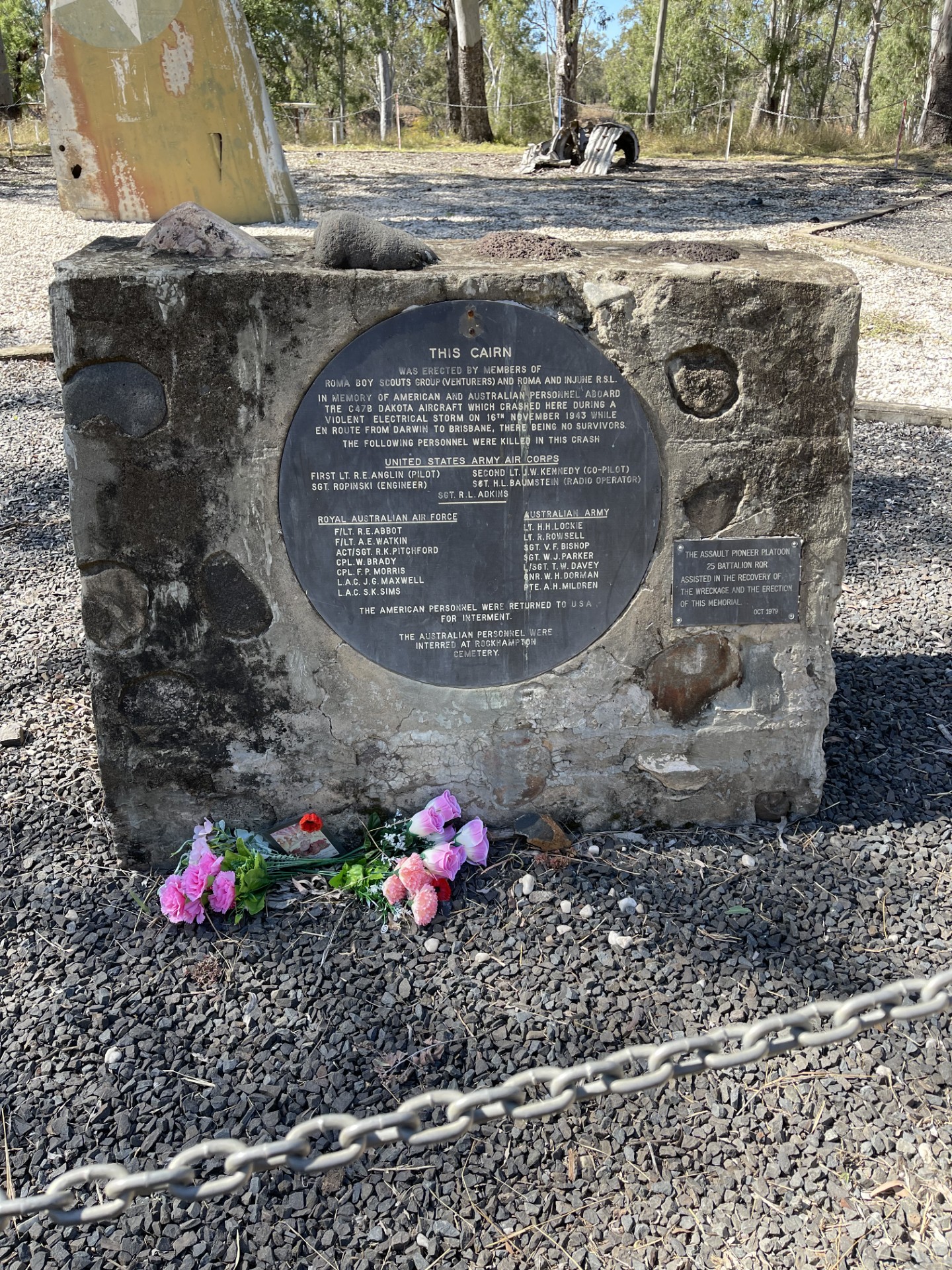 A concrete and stone cairn with inset plaques
