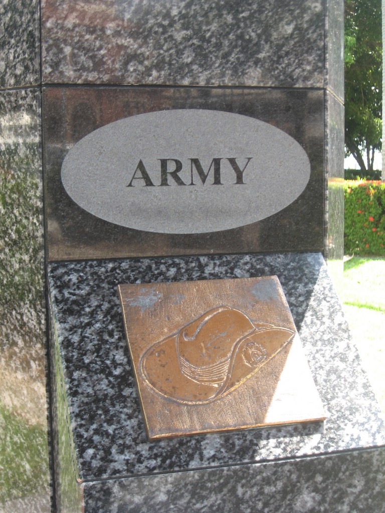 Pillar depicting Army plaque