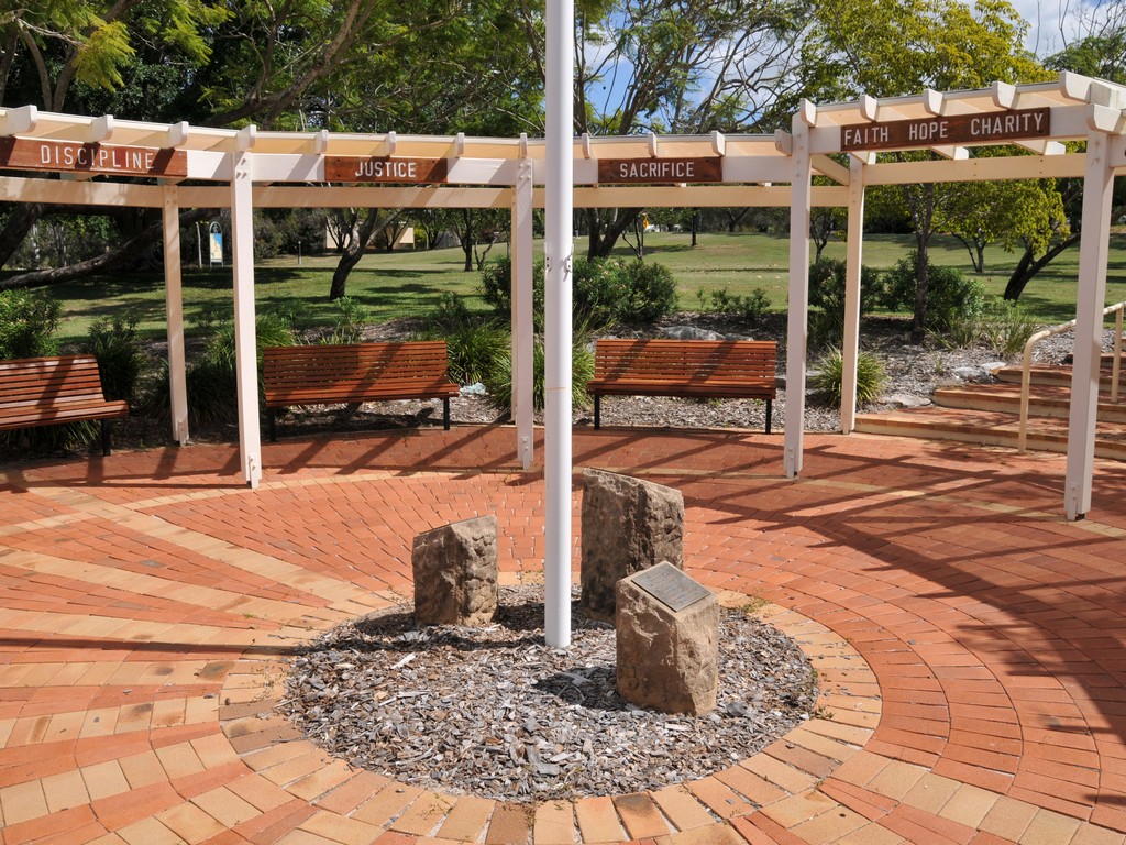Stirling Park Anzac Memorial showing inner circle with sandstone blocks and plaques.
