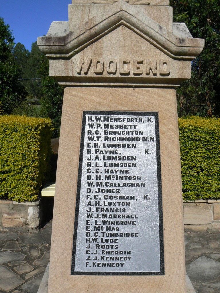 Plaque on the front of the memorial.