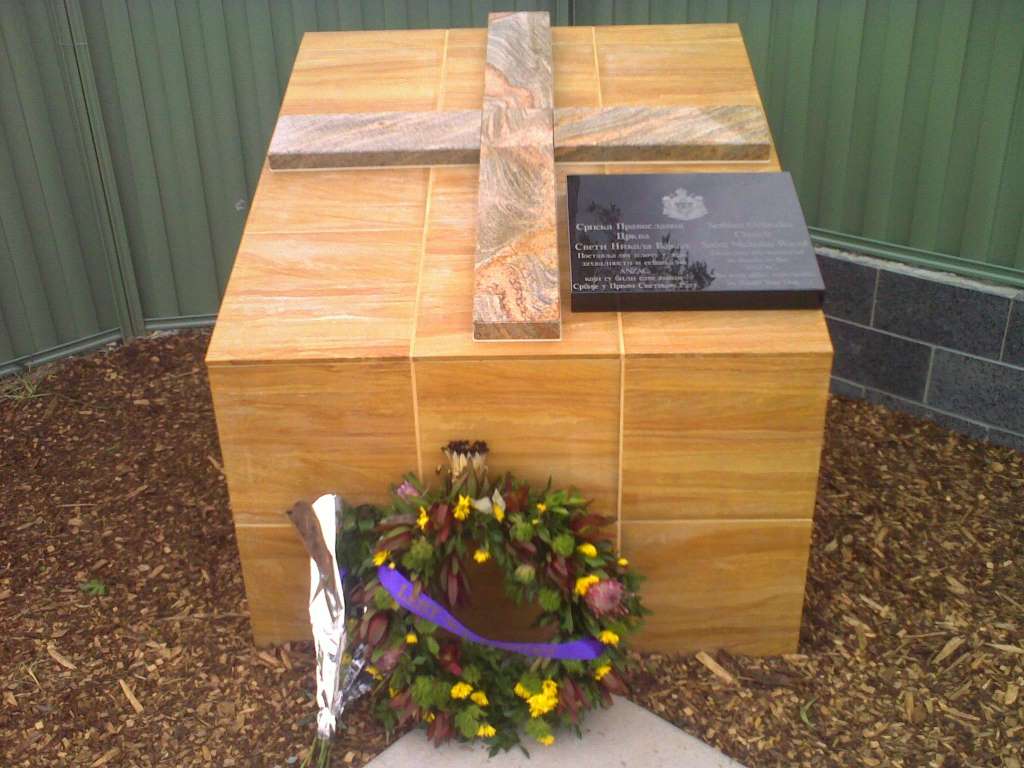 Anzac memorial cross and plaque.