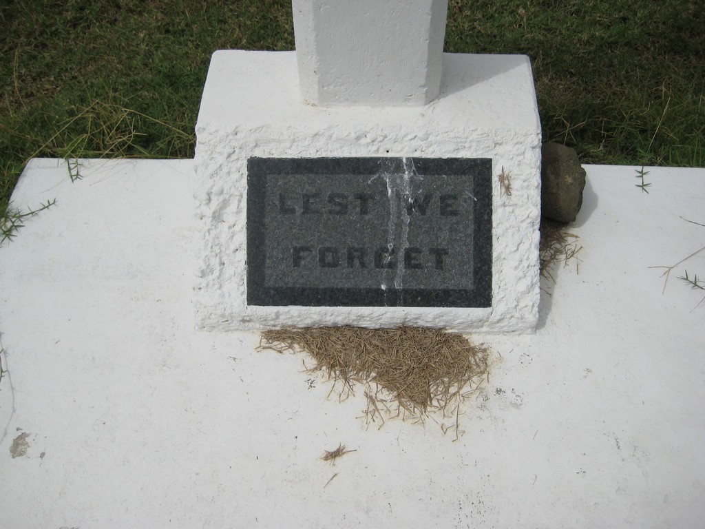Plaque at base of cross at Baralaba
