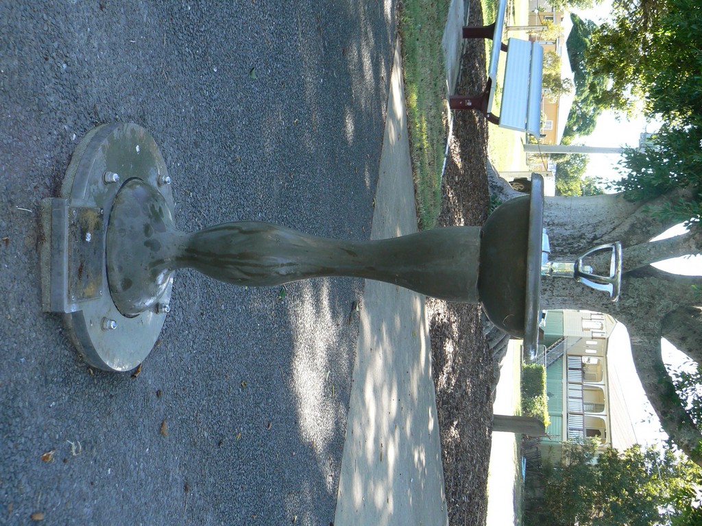 The fountain stands close to the Booval War Memorial facing Green Street.