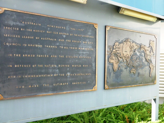 Board with bronze plaques, outside Hervey Bay RSL Services & Memorial Club