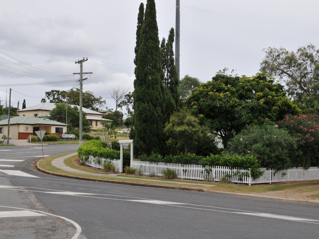 Mount Larcom Memorial Garden lies behind the white picket fence.