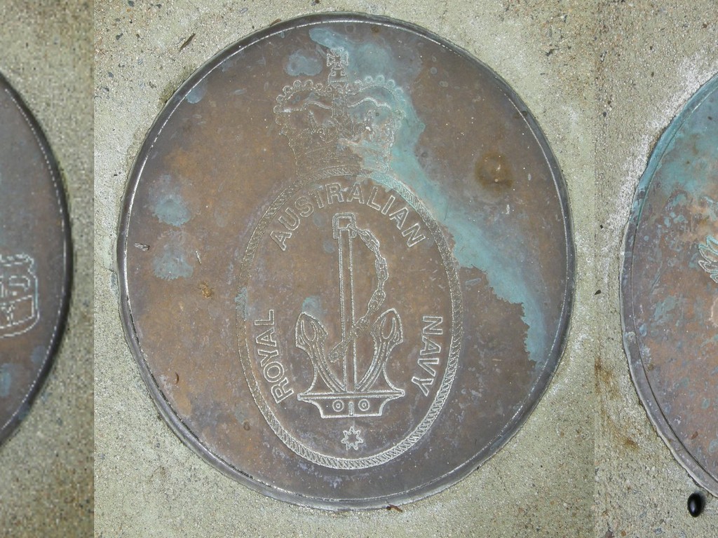 Vietnam Veterans Memorial - Brass Crests in Cement