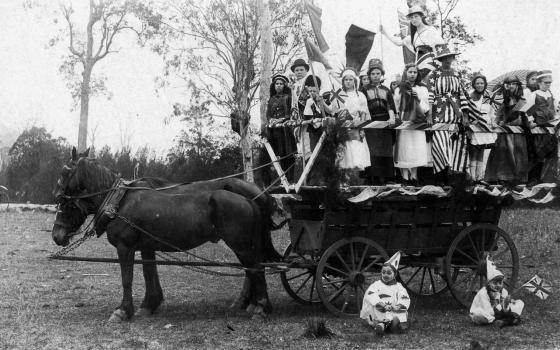 Old photograph of the All Nations float on Mick O'Brien's wagon on the sportsground at Canungra.