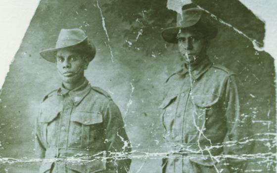 Two aboriginal soldiers from WWI posing for a photo
