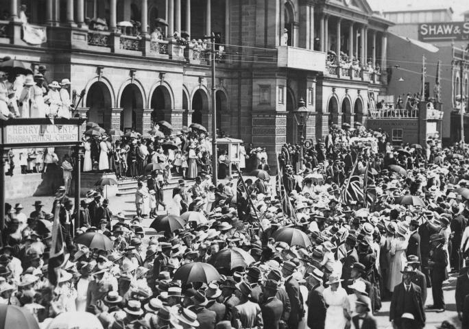 Old photograph of a large crowd of people gathered in Brisbane.