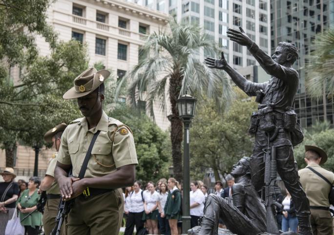 Man giving a speech, Vietnam Veterans Day commemoration service at Anzac Square, Brisbane, 18 August 2023
